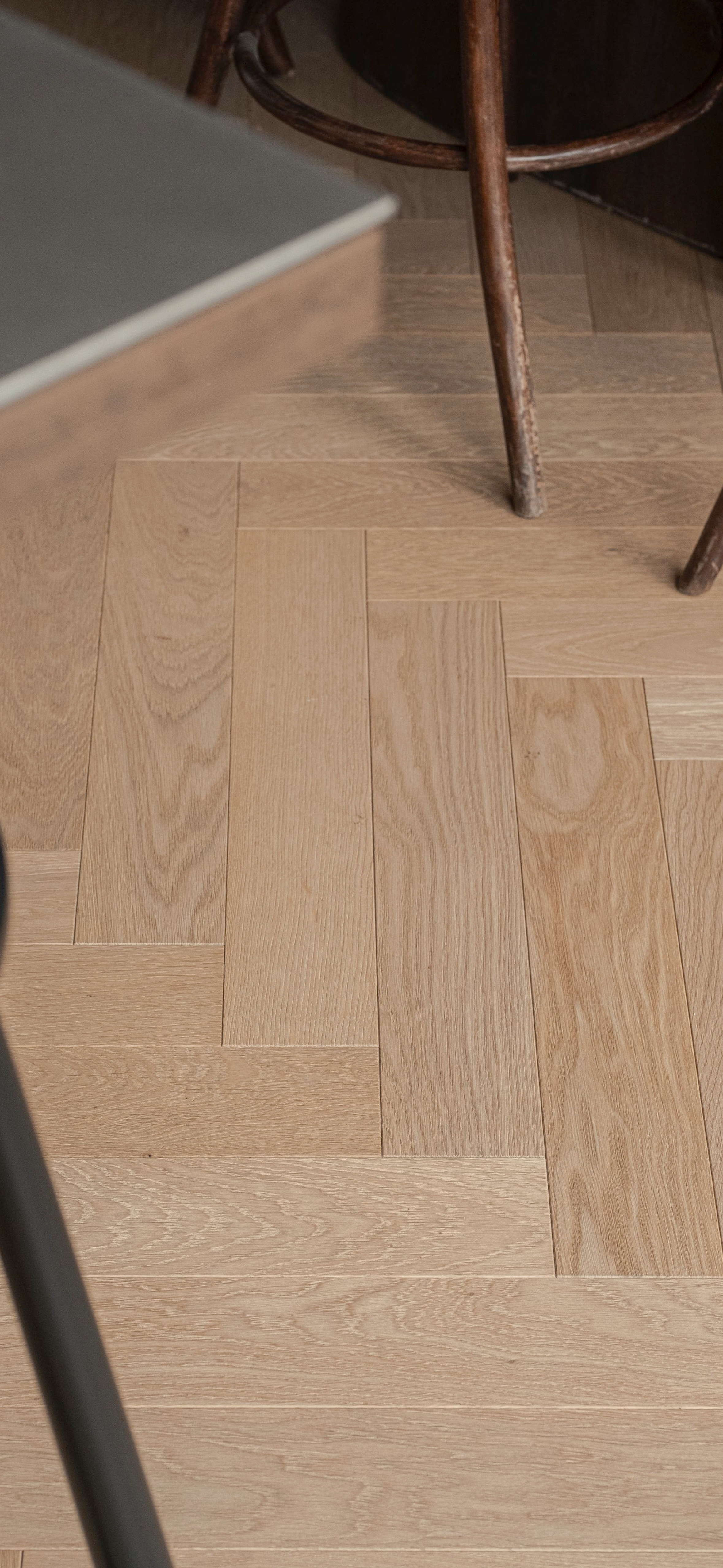 Herringbone oak parquet in a pale natural finish, VOGUE Parquet