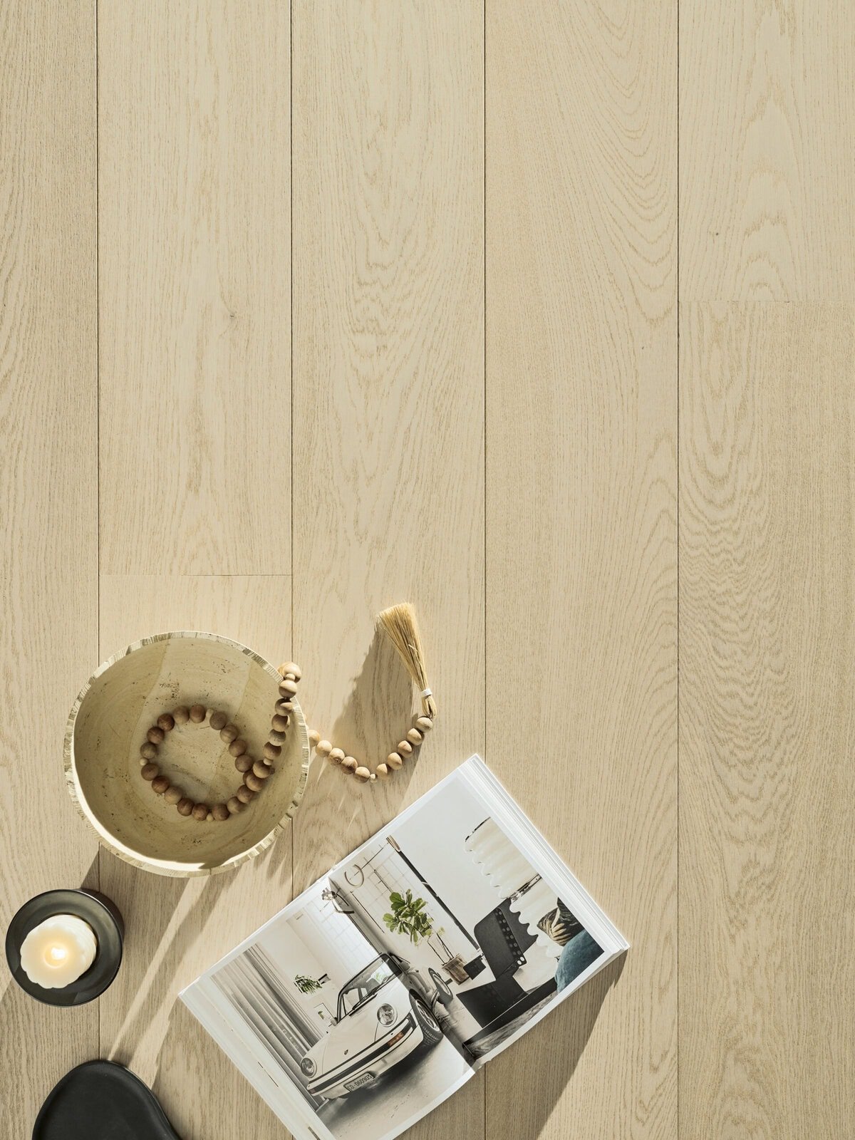 Engineered wood flooring with wide planks and natural finish in a modern interior – Types of Wood Flooring