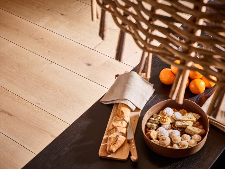 Close-up of architectural detail on a European Engineered Wood Floor showcasing craftsmanship and grain