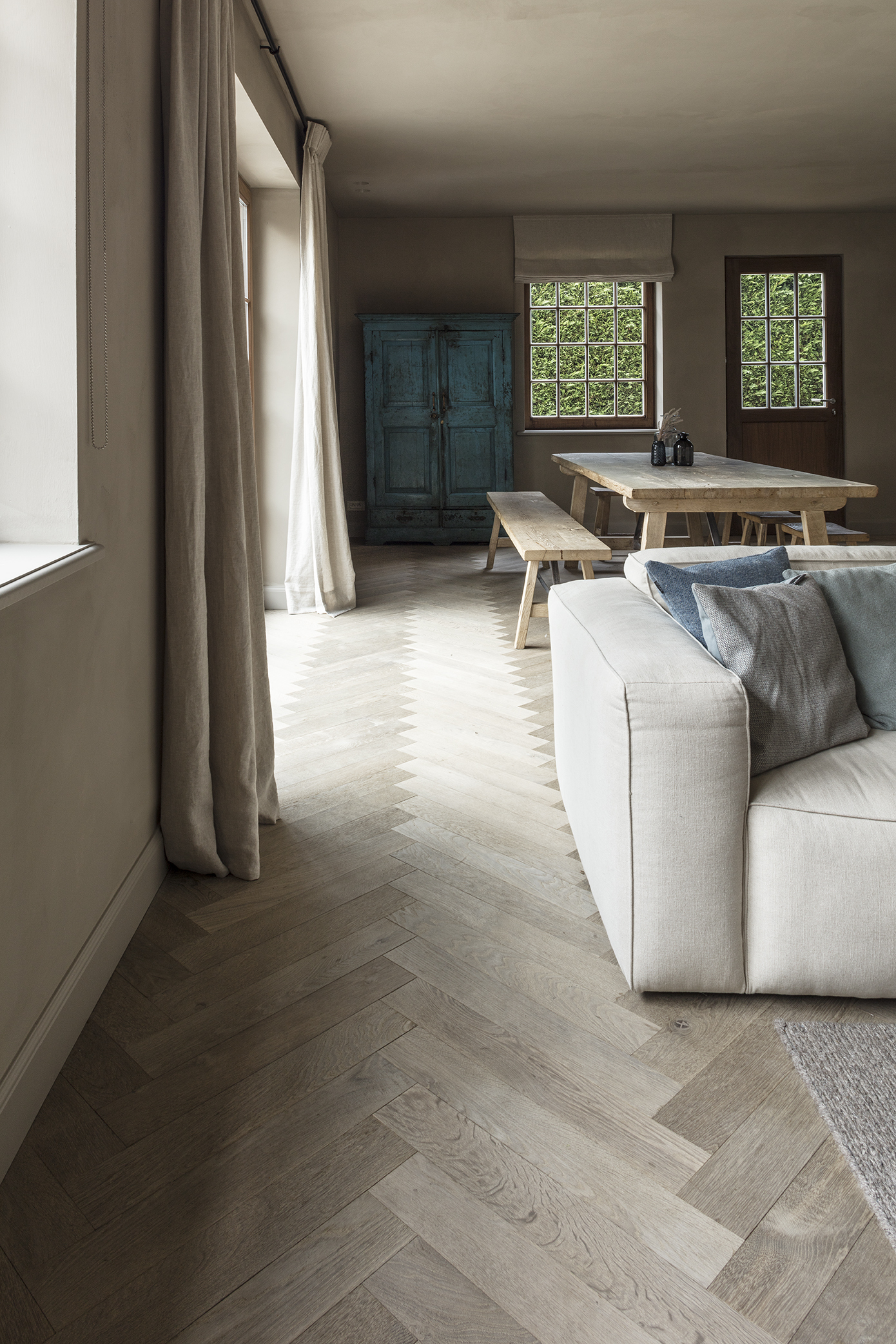 French oak herringbone flooring in modern minimalist interior
