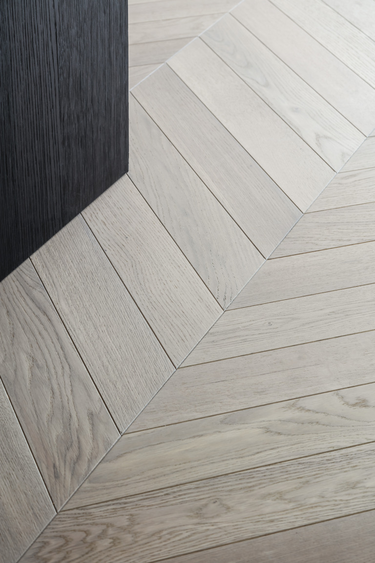 chevron flooring in narrow rooms and architectural corridors
